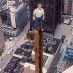 Man standing on beam