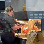 Aussie McDonald's Worker Drying Mop