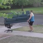 Guy moving couch