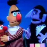 Burt protects Ernie from the Count