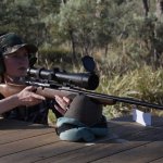 Jess woman with scoped hunting rifle JPP PH