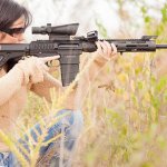 Woman scoped hunting rifle JPP PH