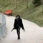 Goth guy running