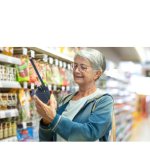 woman walkie talkie grocery store