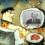 Fred Flintstones watches Sen Joe Biden on TV