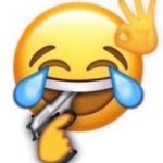 laughing emoji putting a gun in his mouth
