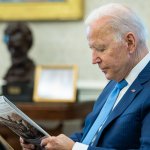 Joe Biden reading a newspaper