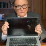 Rudy Giuliani Holding Hunter Biden's Laptop