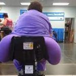 Fat woman on Scooter Grocery Store