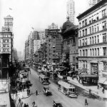 1913 street scene cars and trolly