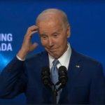 Joe Biden confused scratching his head