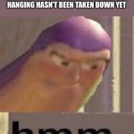 Hmmmm | ME WONDERING WHY THE HALLOWEEN DECORATION OF MY NEIGHBOR HANGING HASN’T BEEN TAKEN DOWN YET | image tagged in hmmmm | made w/ Imgflip meme maker