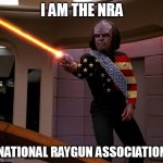 Worf is the National Raygun Association | I AM THE NRA; NATIONAL RAYGUN ASSOCIATION | image tagged in worf wearing an american flag | made w/ Imgflip meme maker