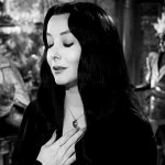 Morticia hand over heart GIF Template