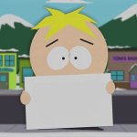 Butters with a sign