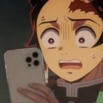 Tanjiro holding phone