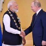 Putin hands Modi highest state award
