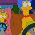 Maggie Simpson driving