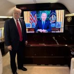 Donald Trump watches Biden