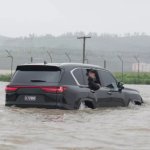 Kim stuck in flood