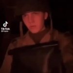 soldier staring at colorful lights meme