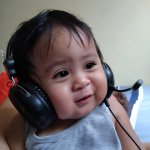 SAD ARTHUR baby with headphones