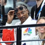 Snoop at Olympics looking down