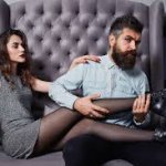 man admires womans leg