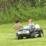 Boy gives girl flowers