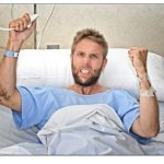 Sick man in hospital bed