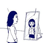 Woman talking to mirror