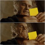 Man reading small card