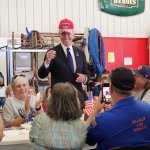 Biden Wearing Trump Hat