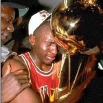 Jordan holding the NBA Trophy