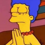 Marge praying