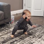 Baby yelling into phone