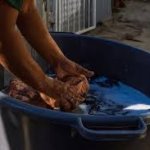 Man Cleaning Bucket