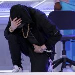 Eminem kneeling