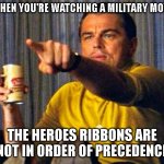 Leonardo Dicaprio pointing at tv | WHEN YOU'RE WATCHING A MILITARY MOVIE; THE HEROES RIBBONS ARE NOT IN ORDER OF PRECEDENCE | image tagged in leonardo dicaprio pointing at tv | made w/ Imgflip meme maker