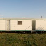 Older mobile home trailer single-wide country living