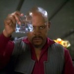 Sisko raizing glass