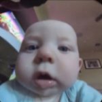 Funny baby in camera