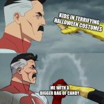 Always outweighs ‘em | KIDS IN TERRIFYING HALLOWEEN COSTUMES; ME WITH A BIGGER BAG OF CANDY | image tagged in omni man blocks punch,memes | made w/ Imgflip meme maker