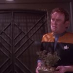 O'Brien Holding A Plant.