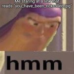 Sus... | Me staring at a link that reads "you_have_been_rickrolled.jpg" | image tagged in buzz lightyear hmm | made w/ Imgflip meme maker