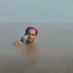 Reporter in Water