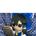 Fumo looking at phone