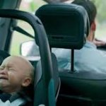 kid in a car crying