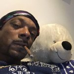 Snoop dog with a teddy bear