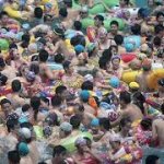 A Pool Packed With People